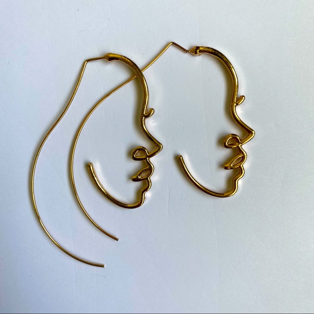 Gold Hoop Earrings with Hollow Face Design